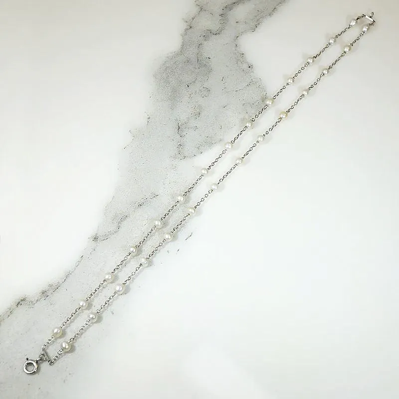 Delicate Edwardian Two Strand Platinum & Pearl Bracelet